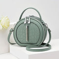 Round Croc-Embossed Handbag with Tassel – Green